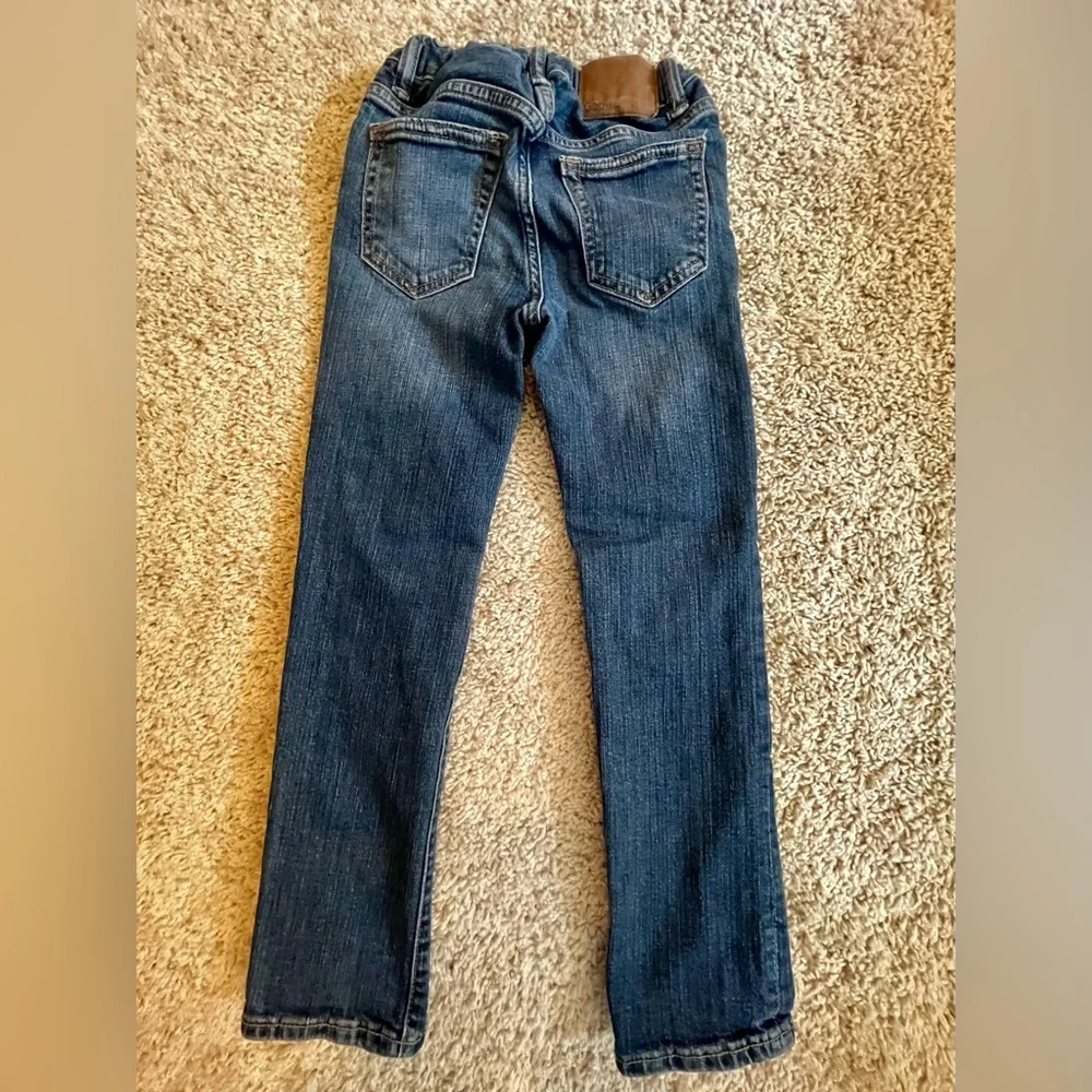 Gap 1969 size 7 slim jeans with distressed finish. Adjustable waist great cond